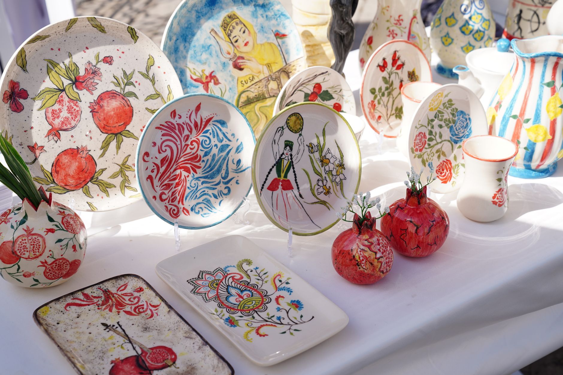 Vibrant Azerbaijani ceramic dishes showcasing traditional designs and patterns.