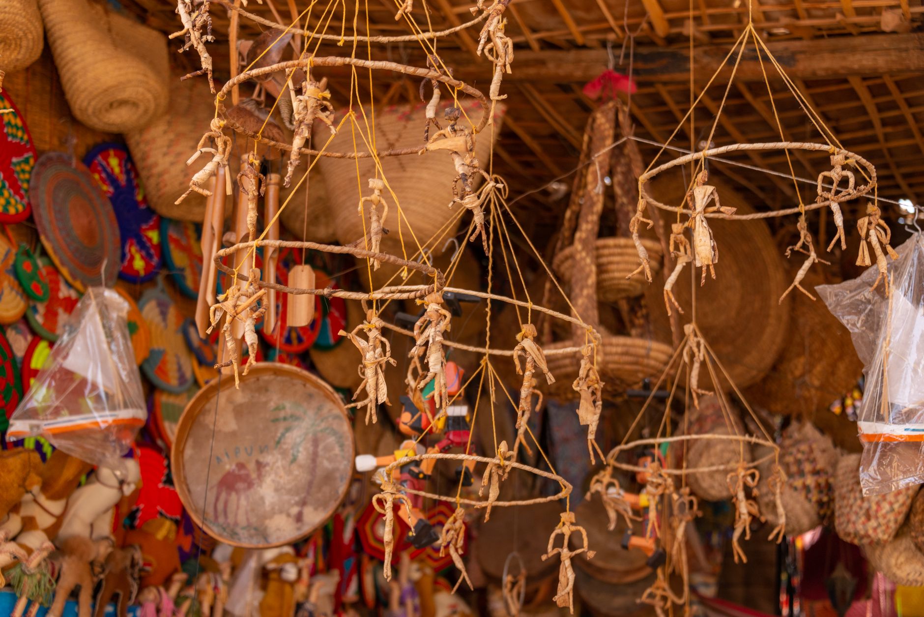 Vibrant and detailed shot of handmade crafts and ornaments displayed at a traditional market stall.