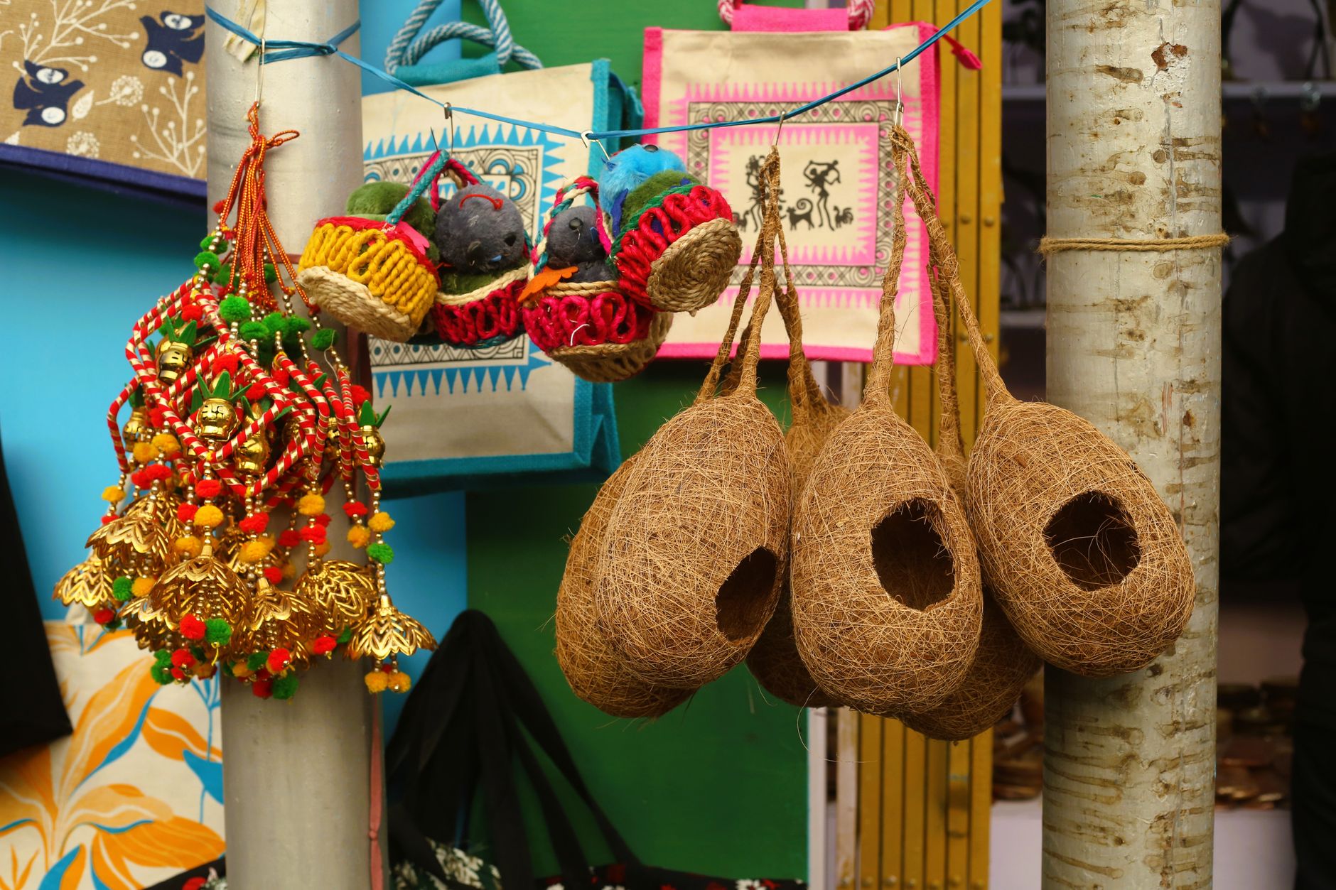 Colorful assortment of handcrafted items at an artisan market.